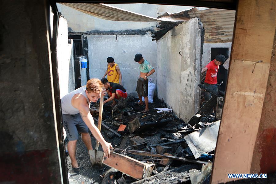 PHILIPPINES-QUEZON CITY-SLUM AREA-FIRE