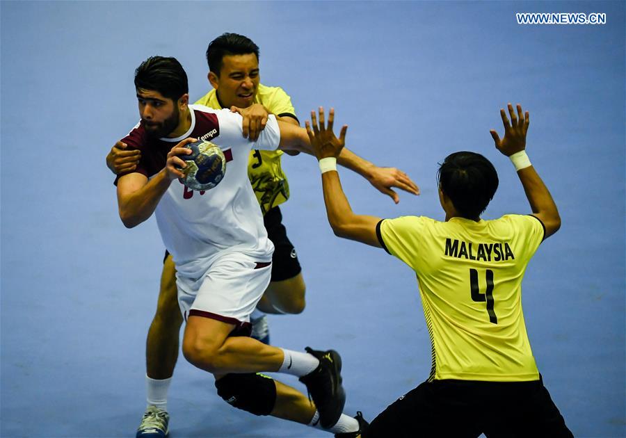 (SP)INDONESIA-JAKARTA-ASIAN GAMES-HANDBALL-MALAYSIA VS QATAR