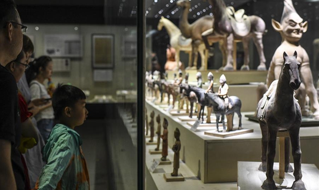 Visitors view exhibits at Xinjiang Uygur Autonomous Region Museum