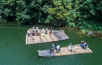 Water concert of bamboo flute staged in east China's Hangzhou